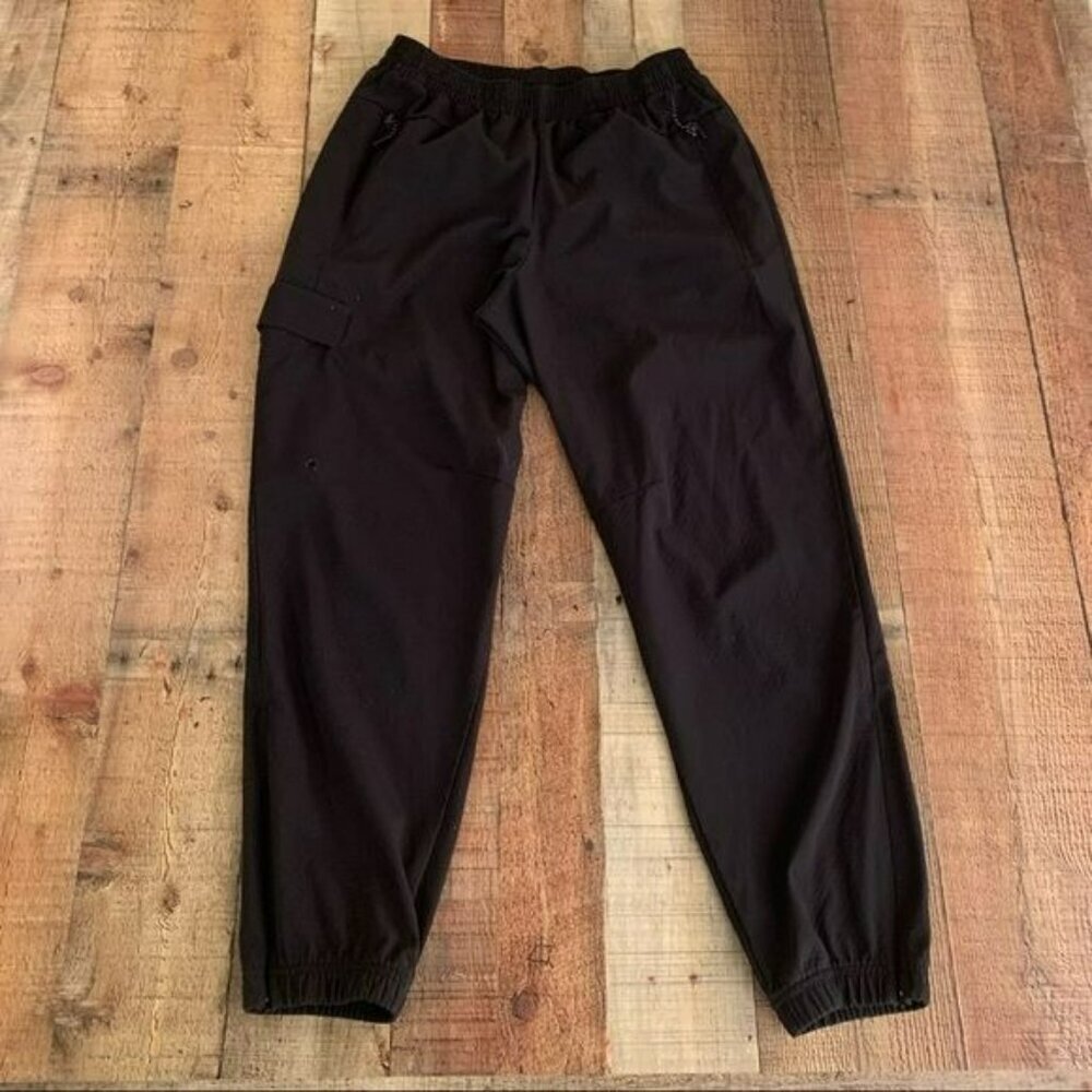 Adidas womens size medium track pants in black with ankle zipper